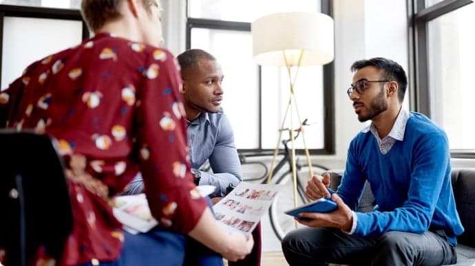 Three people at meeting